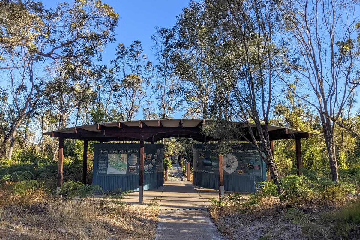 Entrance to the Lake Muir boardwalk and observatory; a shelter with information signs