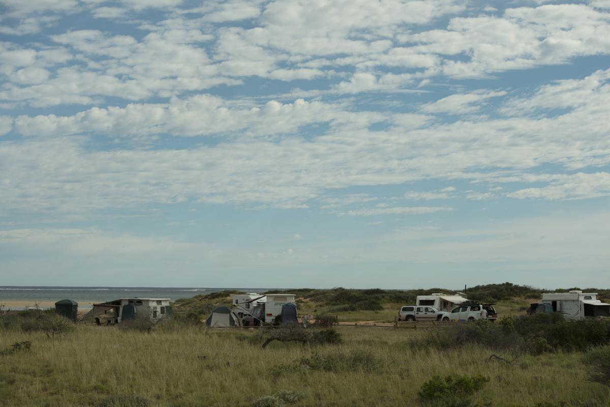 Tulki Beach Campground View of people camping