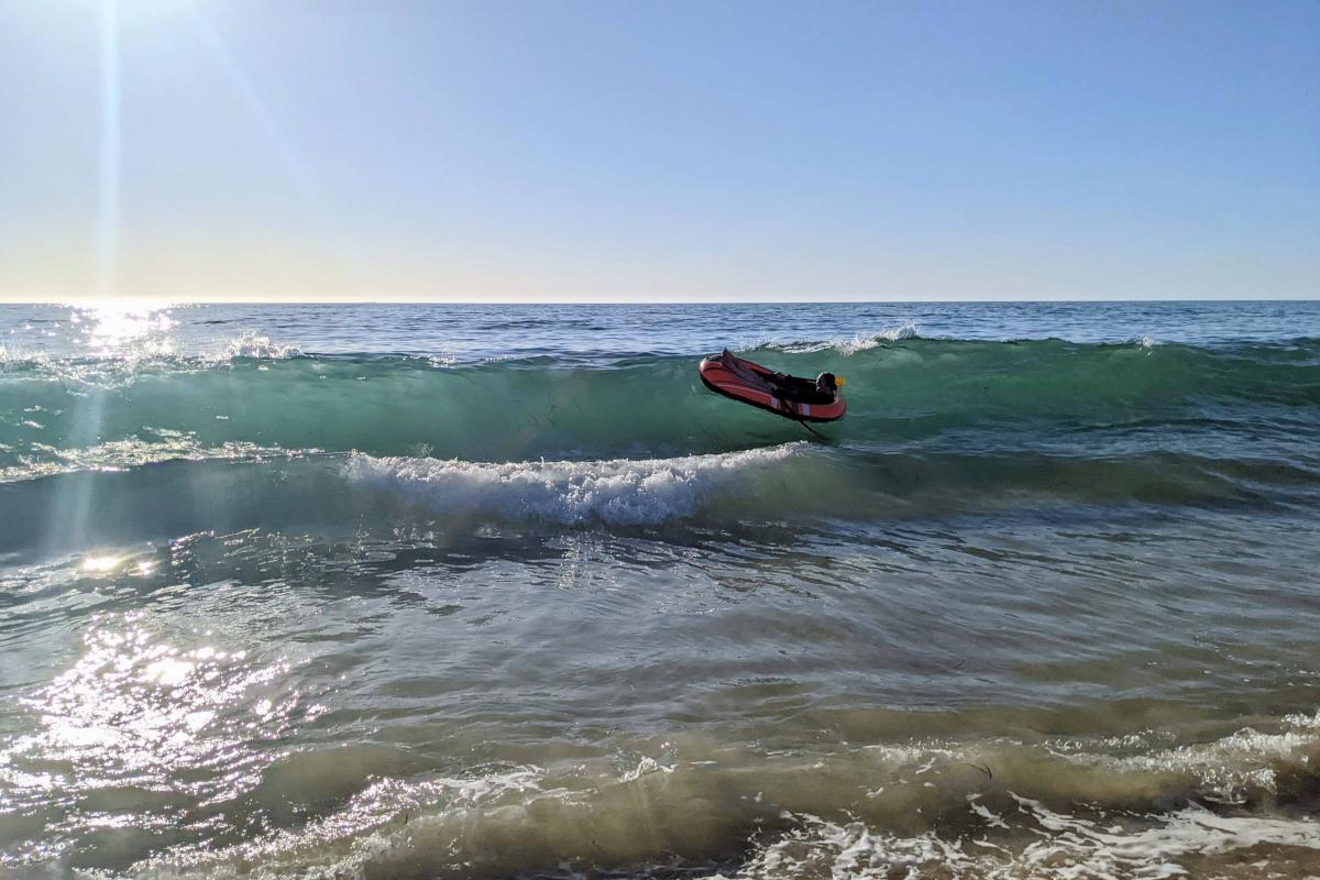 Floating on the waves at Belvidere Beach Floating on the waves at Belvidere Beach