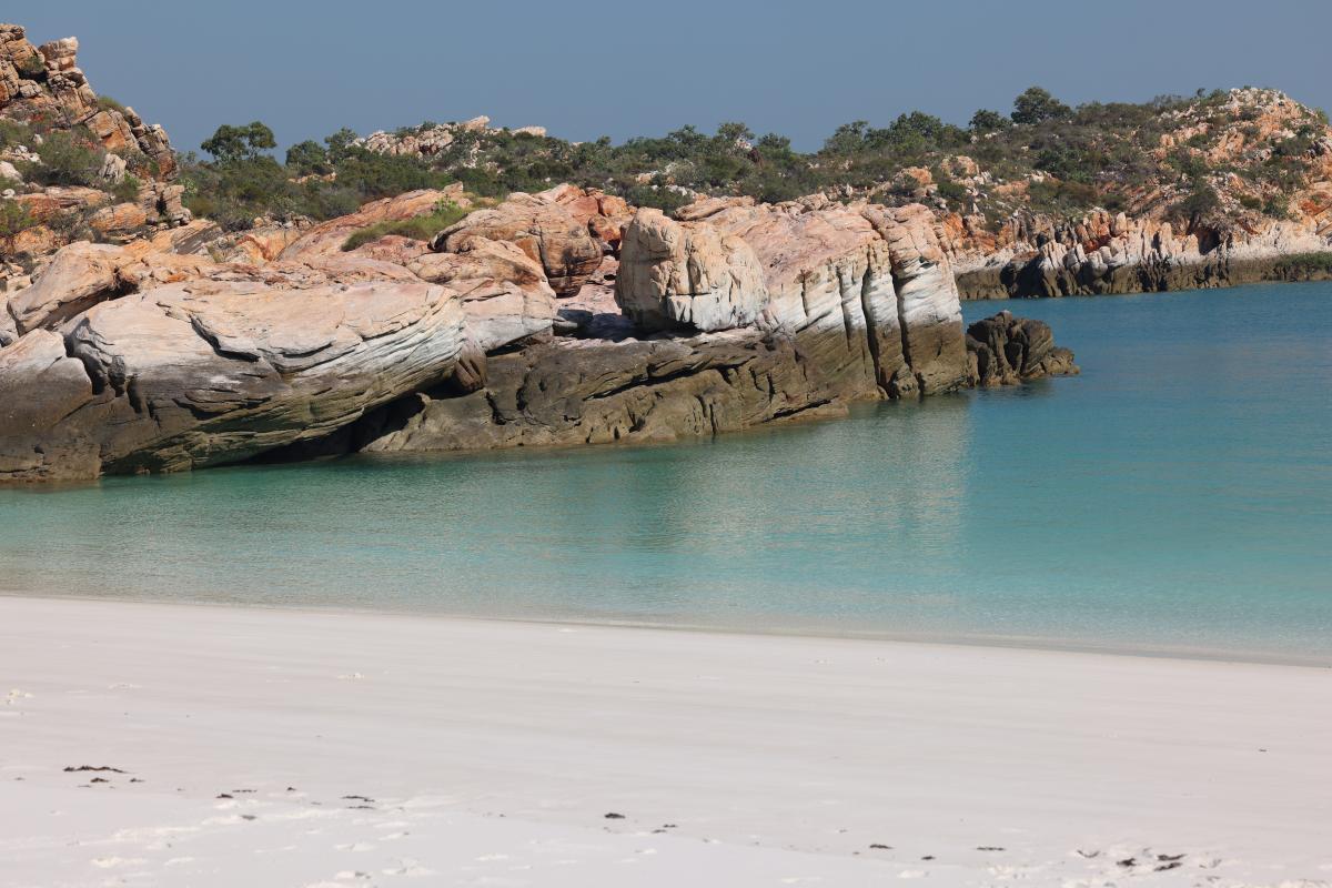 Ngalangalangarr (Silica Beach) Rocks near beach with water marks.
