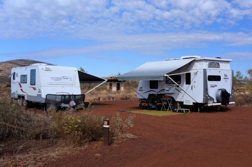 two caravans parked on red dirt