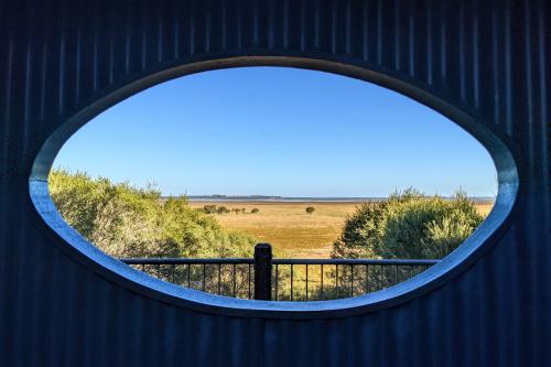 View over the wetlands at Lake Muir from inside the Lake Muir Observatory