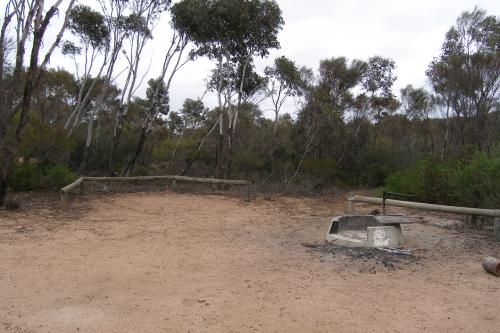 Campsite with fire place at Mount Ragged campground