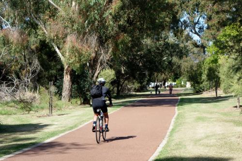 person riding a bike in adenia park