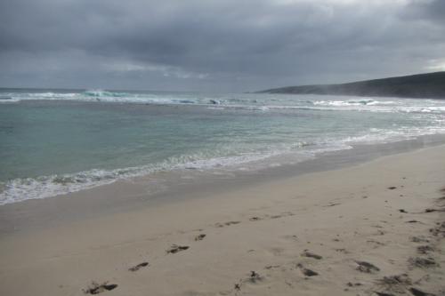 Waves coming on to the beach.