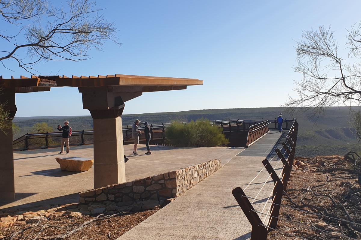Visitors enjoying the open interpretive space and the cantilevered walkway out over the gorge