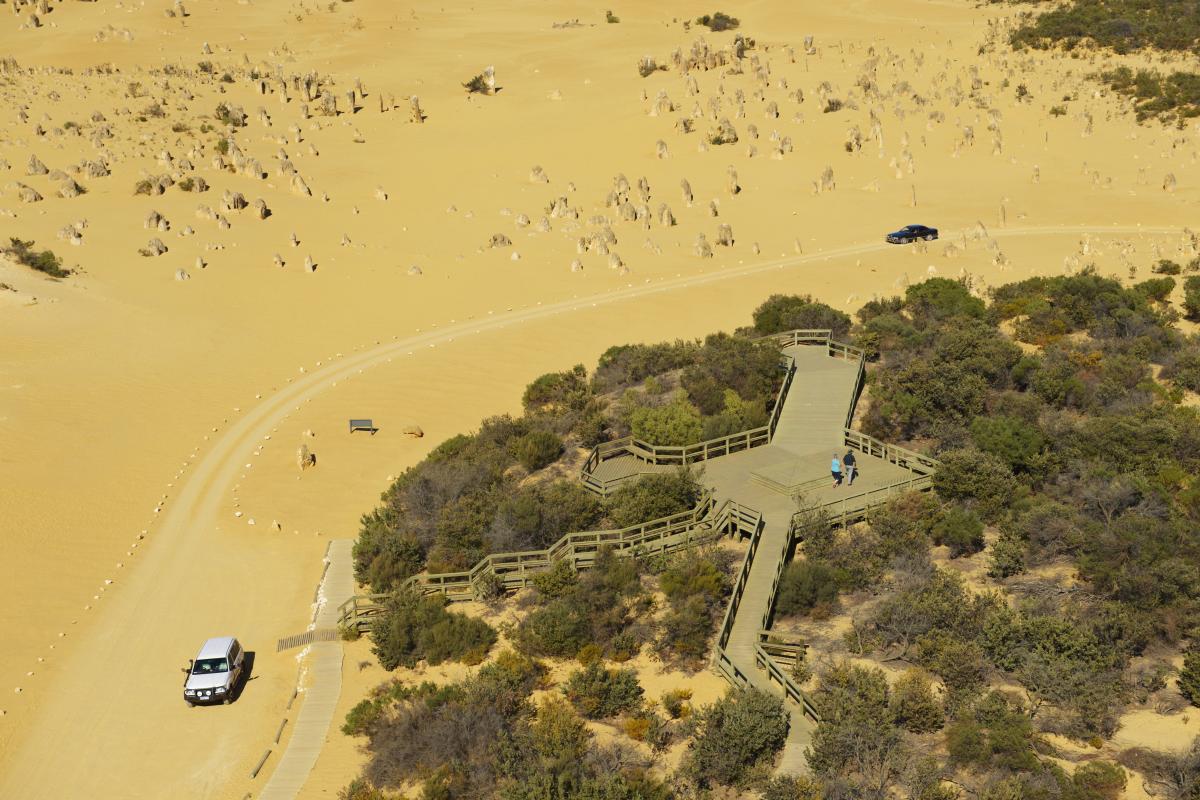 Pinnacles Desert Lookout and Drive aerial view of elevated visitor lookout platform in a dune landscape with unusual rock formations