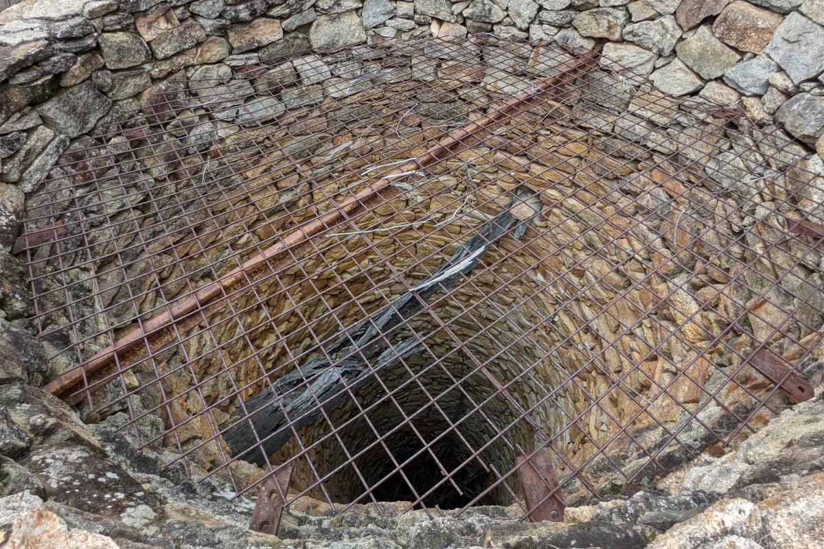 View looking down an old well