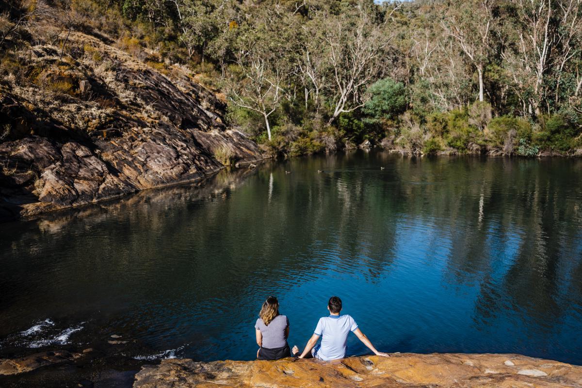 Visitors enjoying the view of the Serpentine Falls
