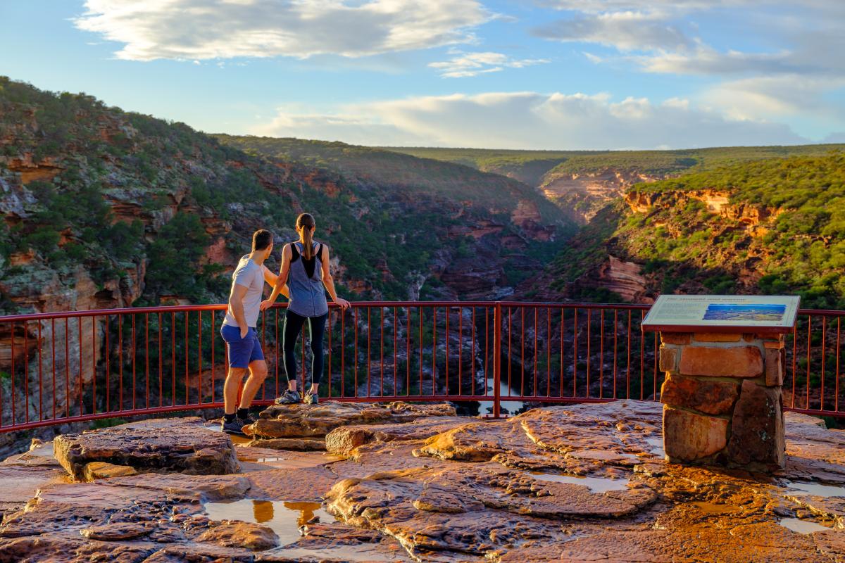 Visitors at Z Bend lookout showing interpretive signage and views to the river and valley below