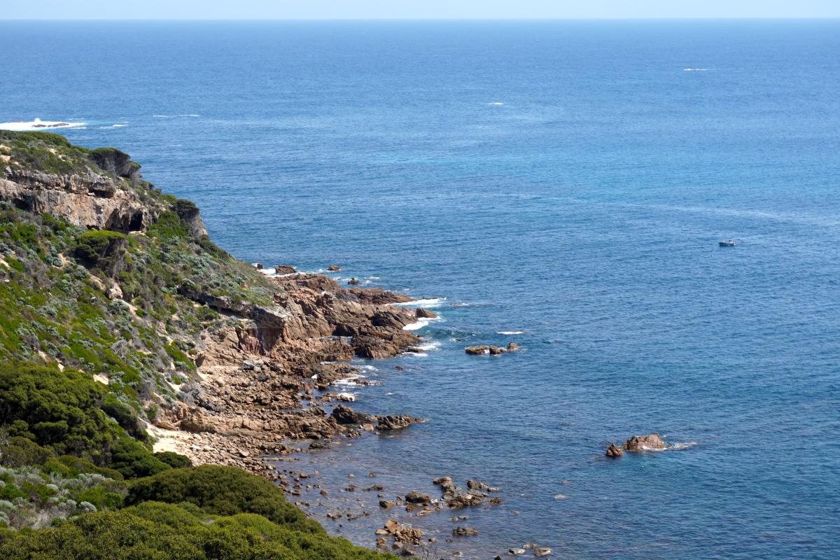 rocky coastline with blue ocean