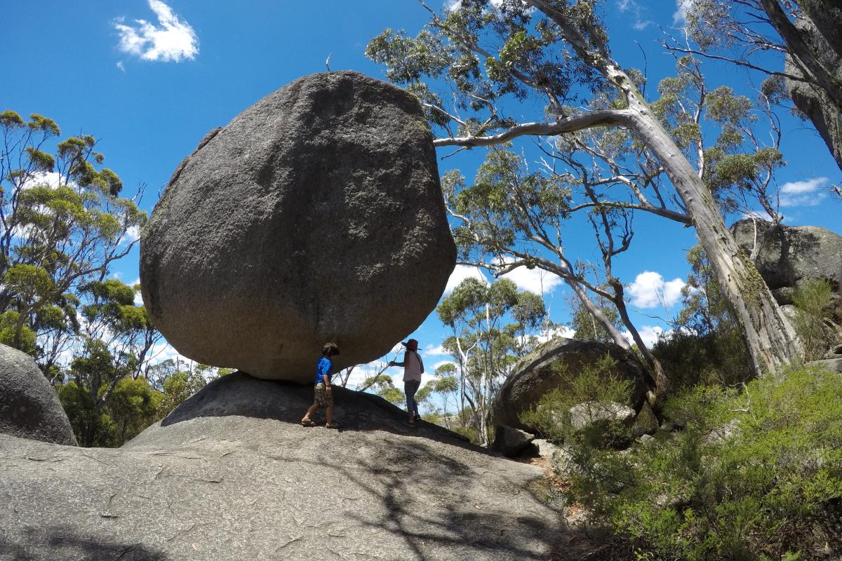 granite boulder balanced on top of granite outcrop
