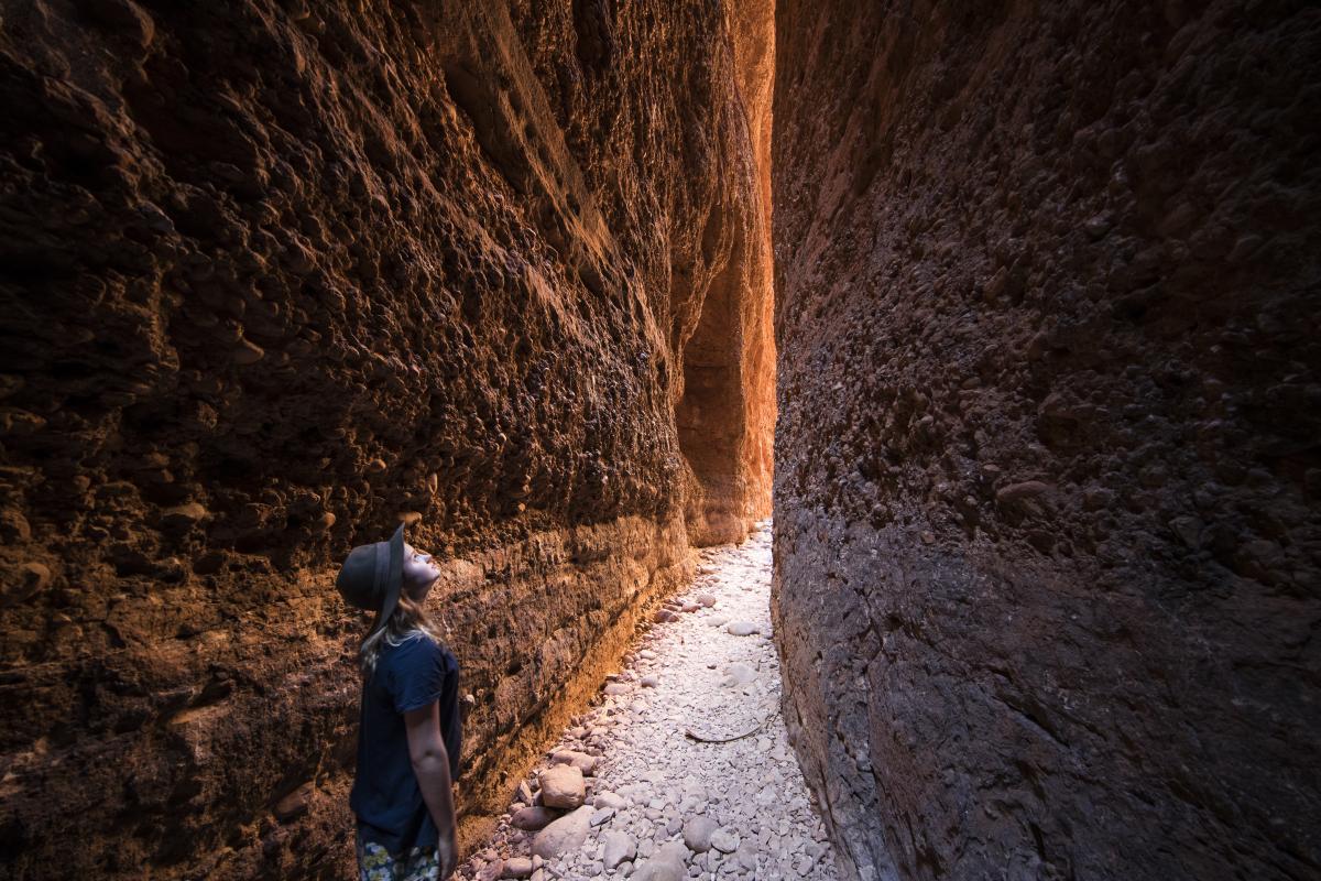 Echidna Chasm Person walking through the Echidna Chasm.