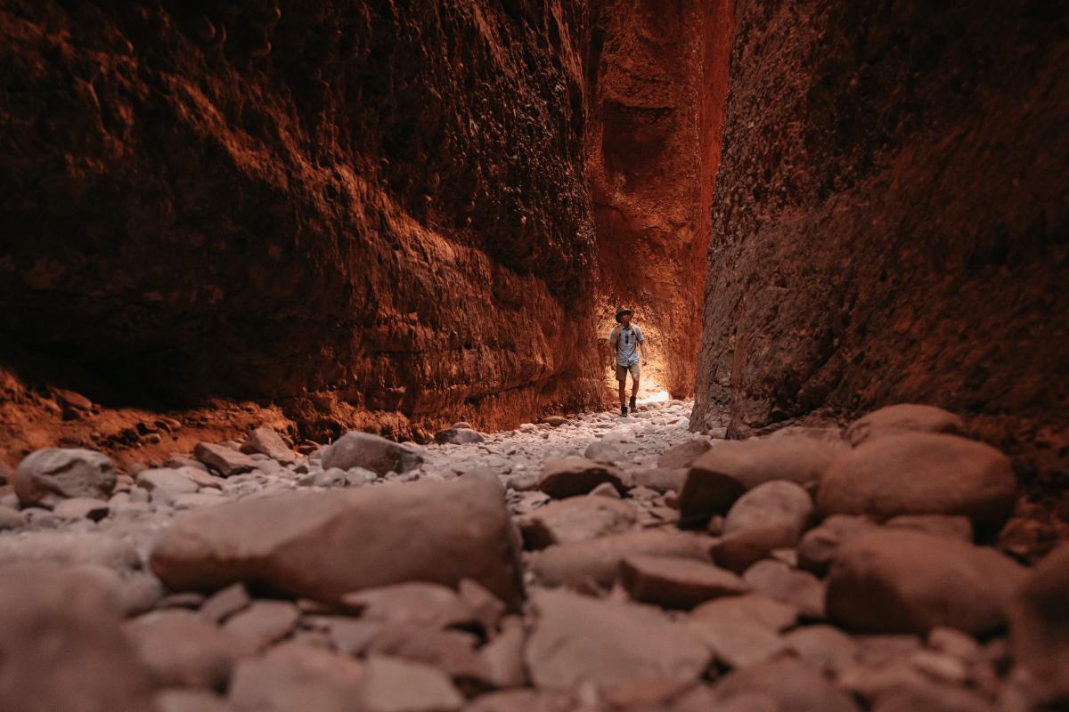Person walking through the Echidna Chasm.