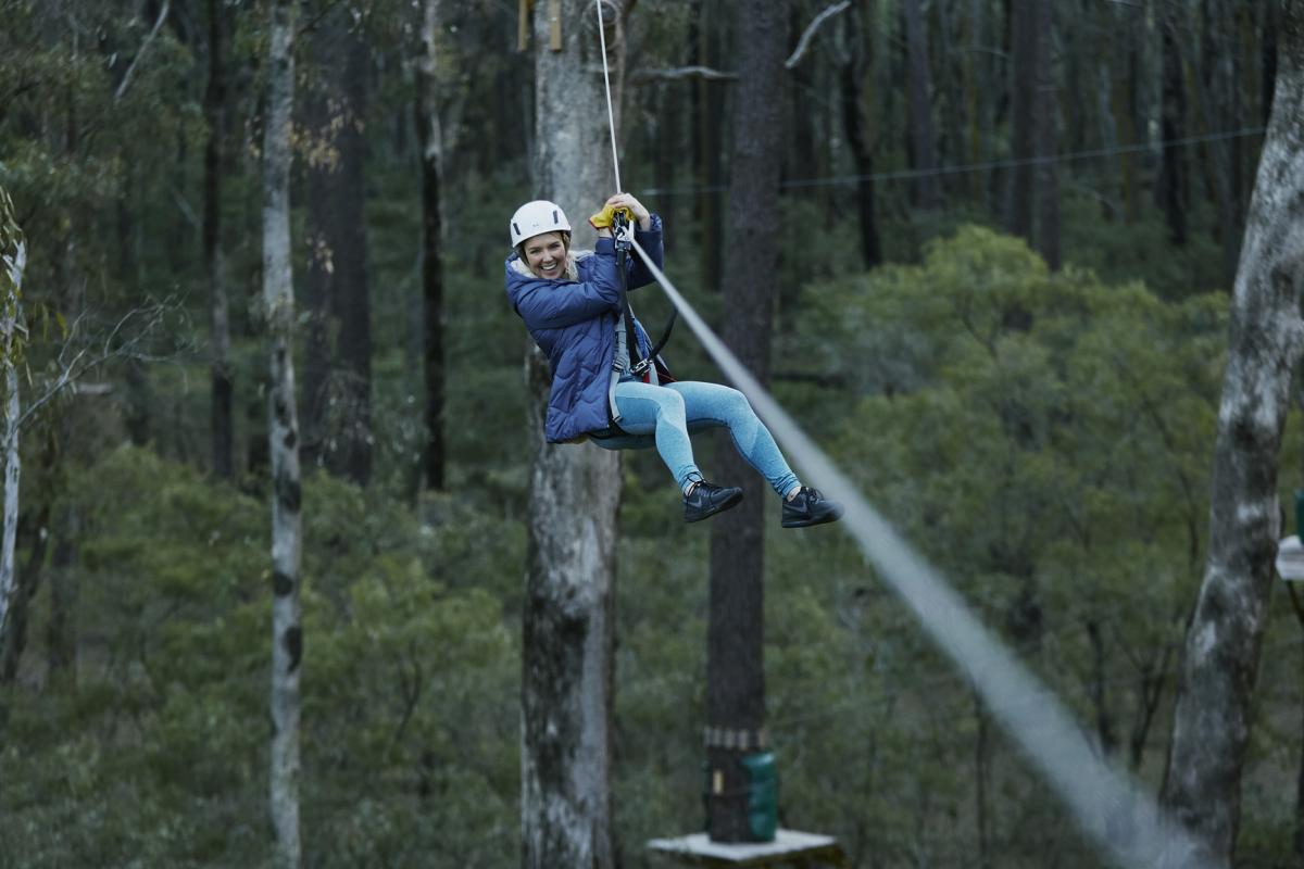 View of woman on high ropes course in Tuart Forest