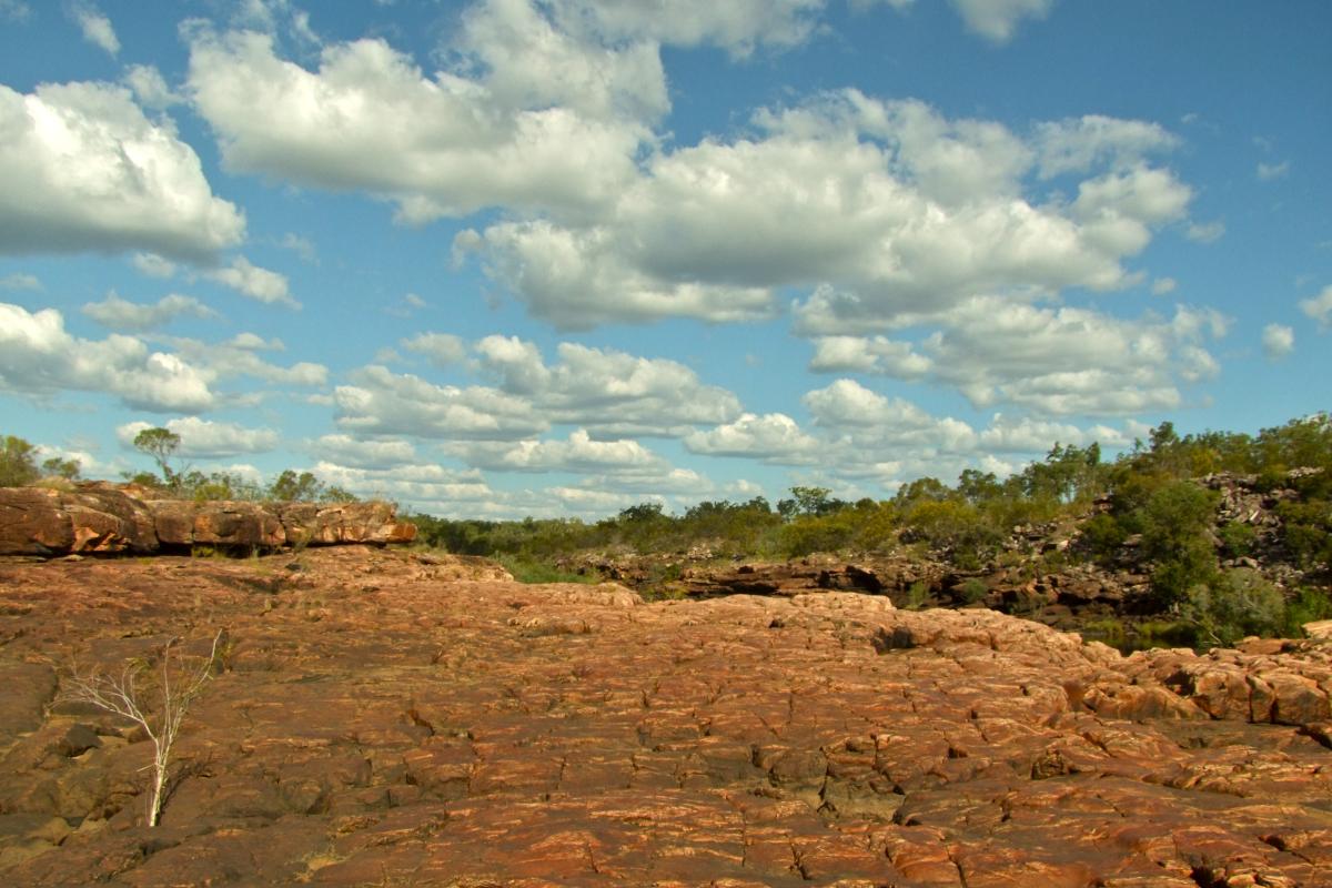 red granite rocks and light clouds in the Kimberley outback