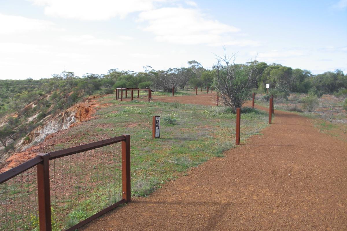 Compacted earth pathway leading to lookout structure