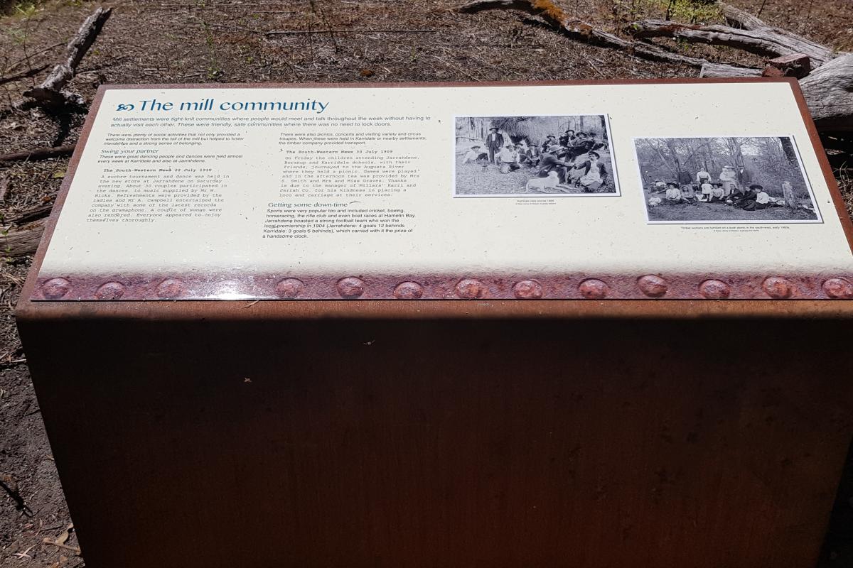 Jarrahdene walk trail at Jarrahdene Campground interpretive sign sharing stories of the historic mill site