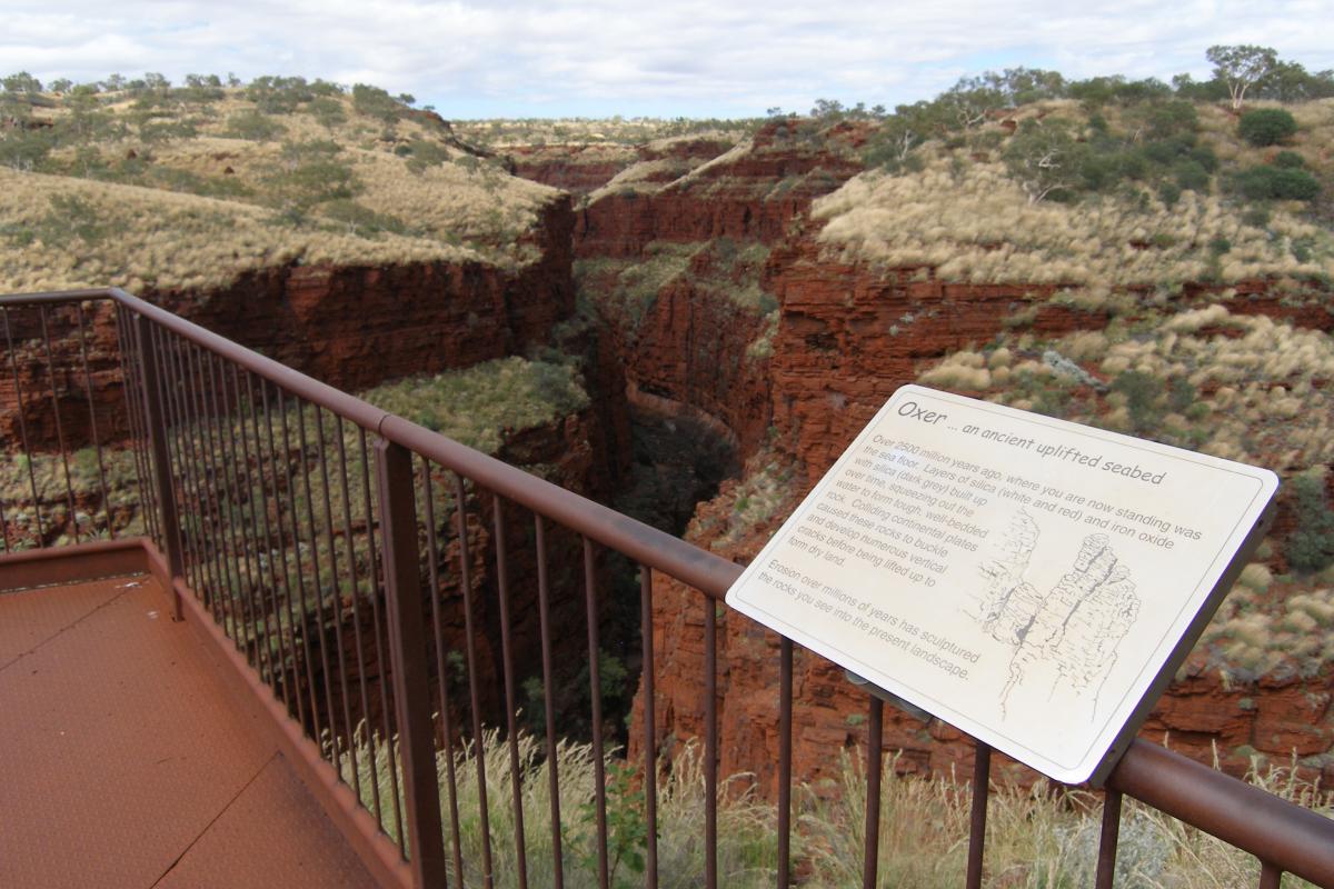 interpretive sign on the hand rails of oxer lookout
