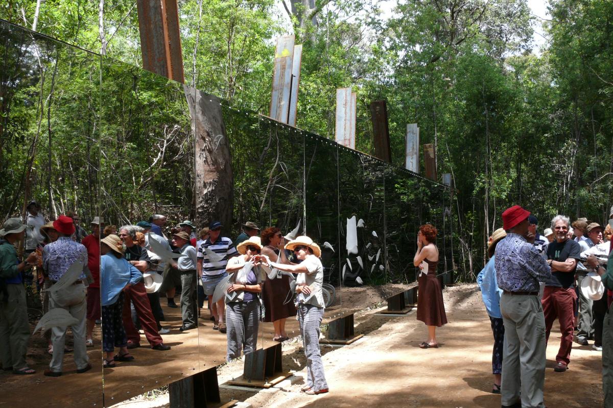 visitors walking in front of the mirror wall of perspective at swarbrick