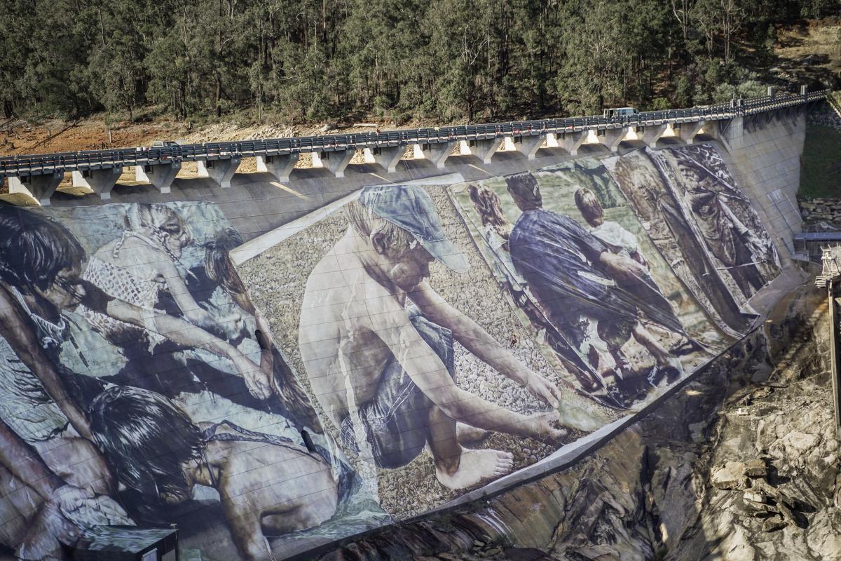 the mural on the wellington dam wall is a collection of photos from local people who loved coming here as children and still have a strong connection to this place