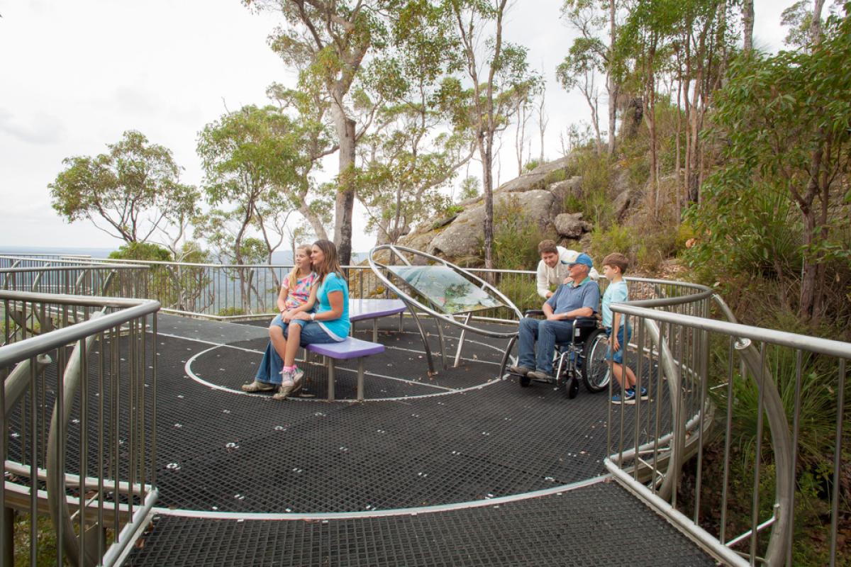 family enjoying the views from the wilderness lookout