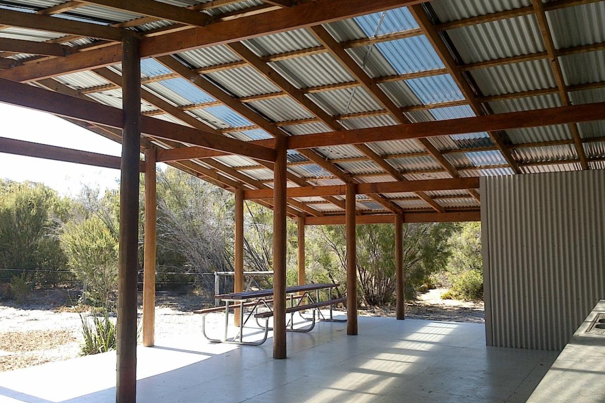 inside a building for camping with vegetation in the background