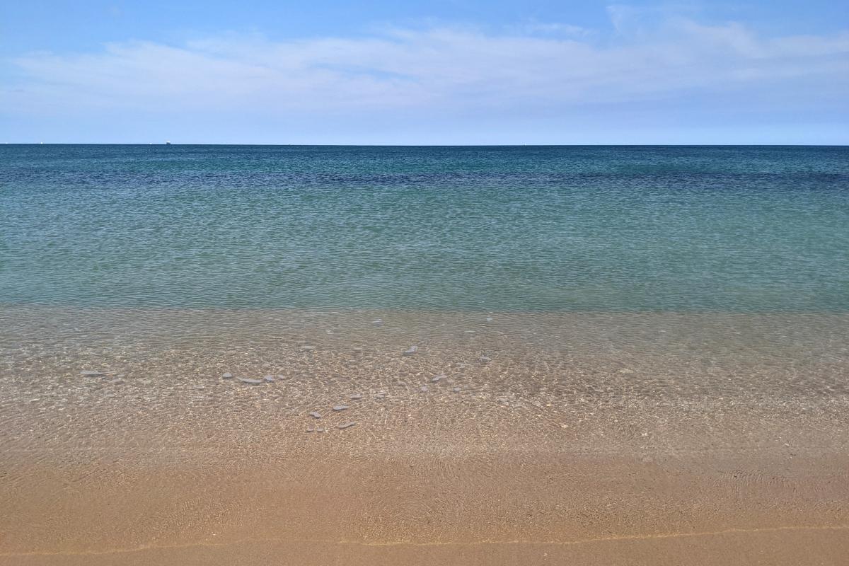 Clear calm ocean water at Belvidere Beach