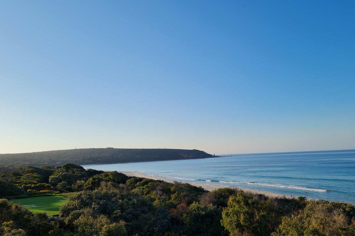 Overlooking Bunker Bay with calm seas at dusk.