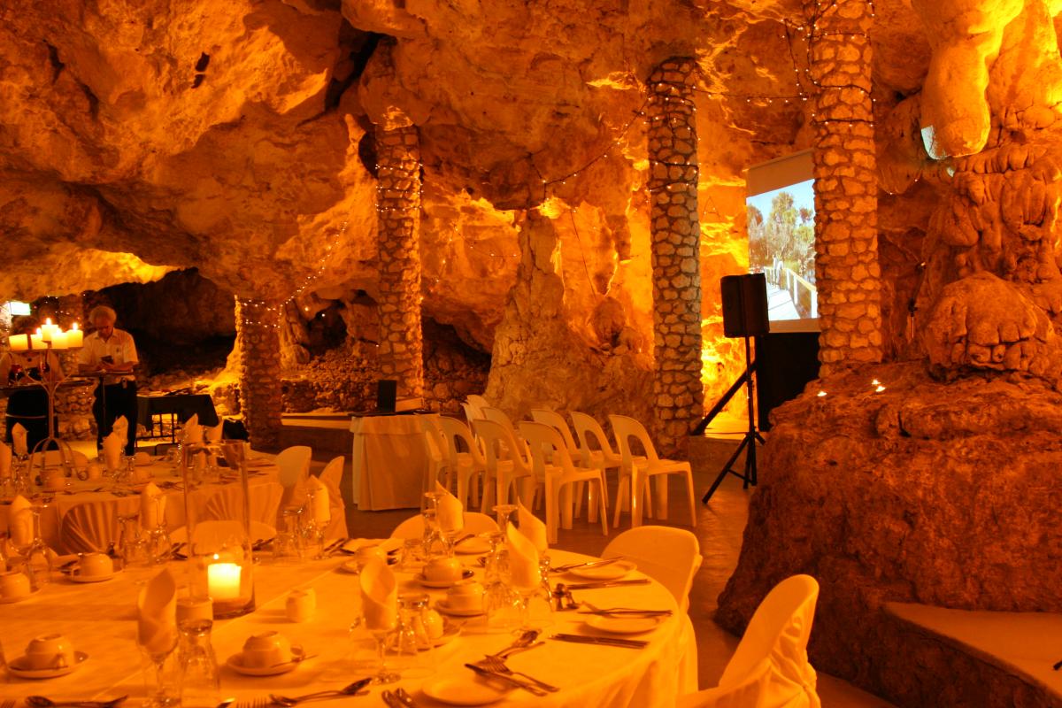 Wedding reception in Cabaret Cave. cabaret cave with table and chairs for a wedding reception