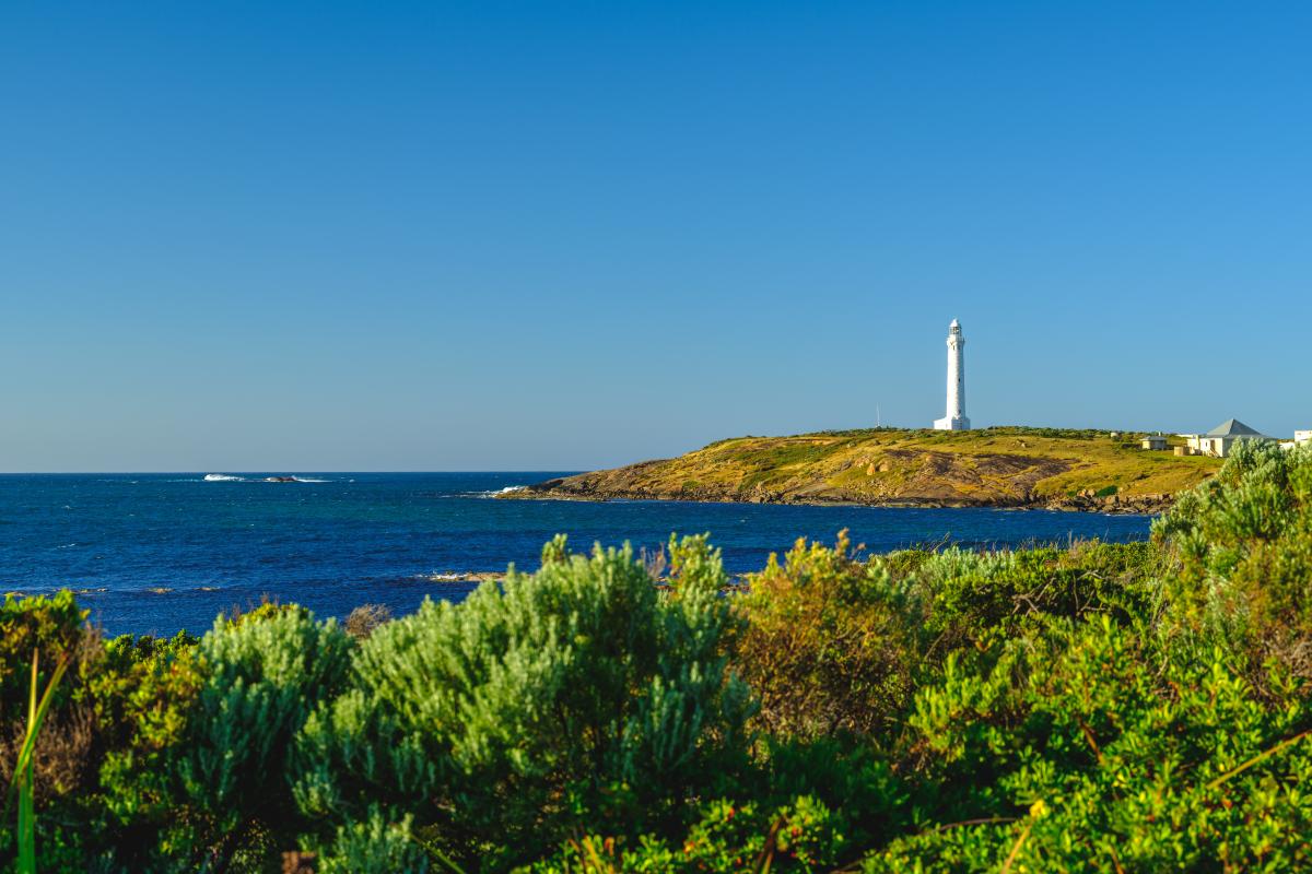 Looking over a bay at Cape Leeuwin Lighthouse