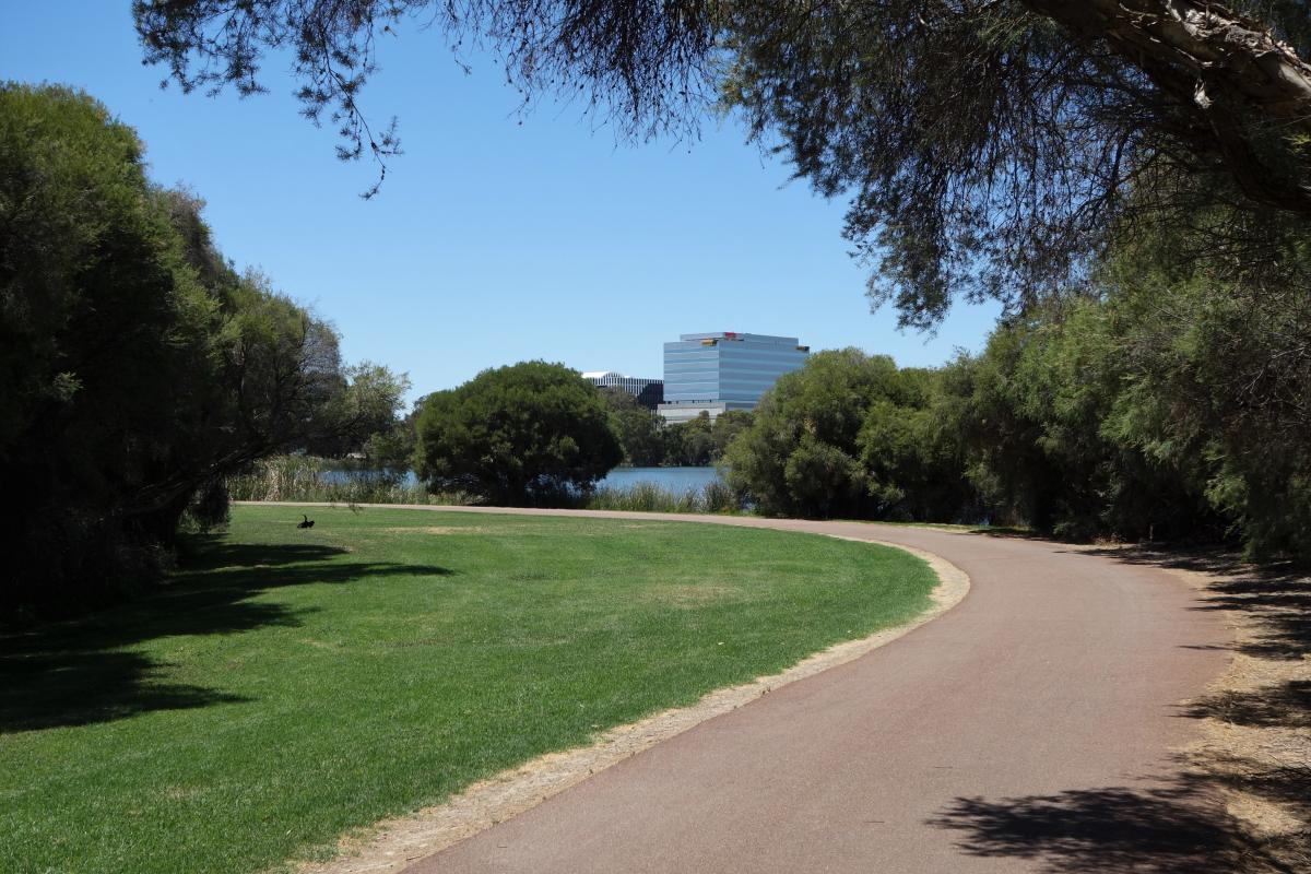 A wide sealed pathway winds through Floreat Lakes.