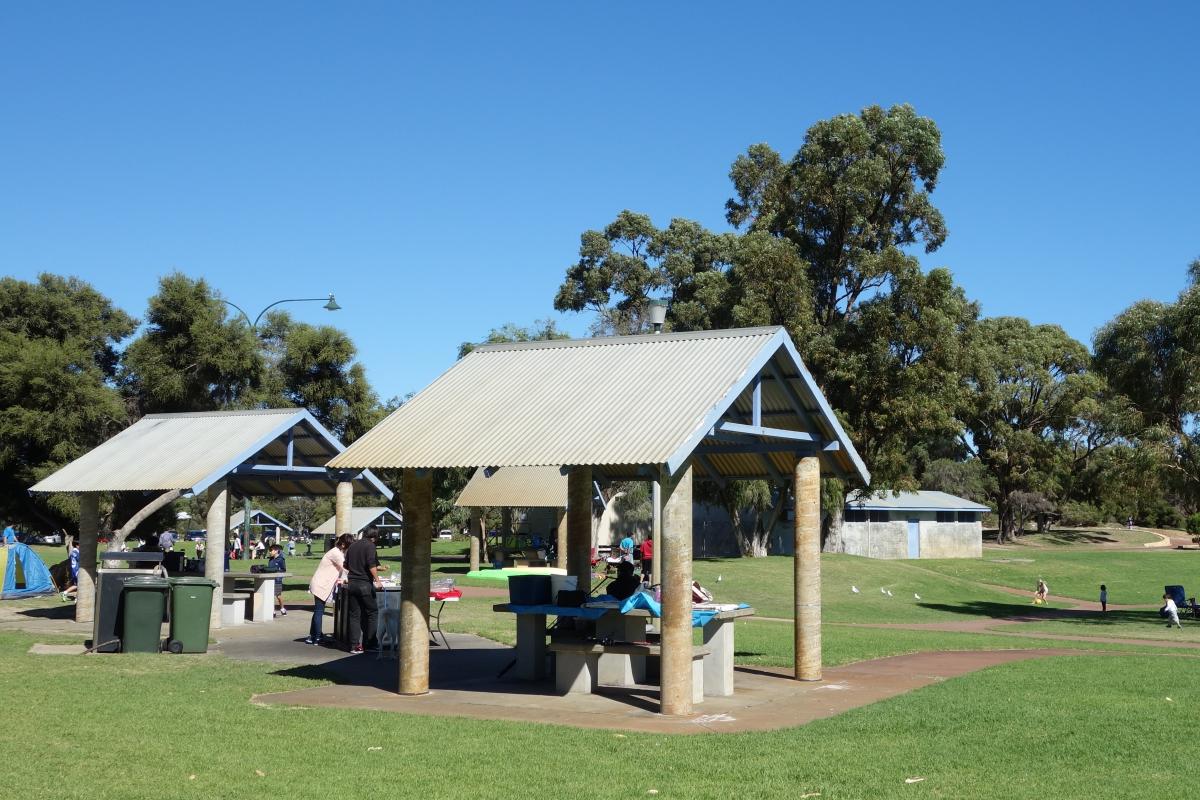 Individual picnic shelters have tables, gas barbecues and bins at John Graham Reserve in Woodman Point Regional Park.