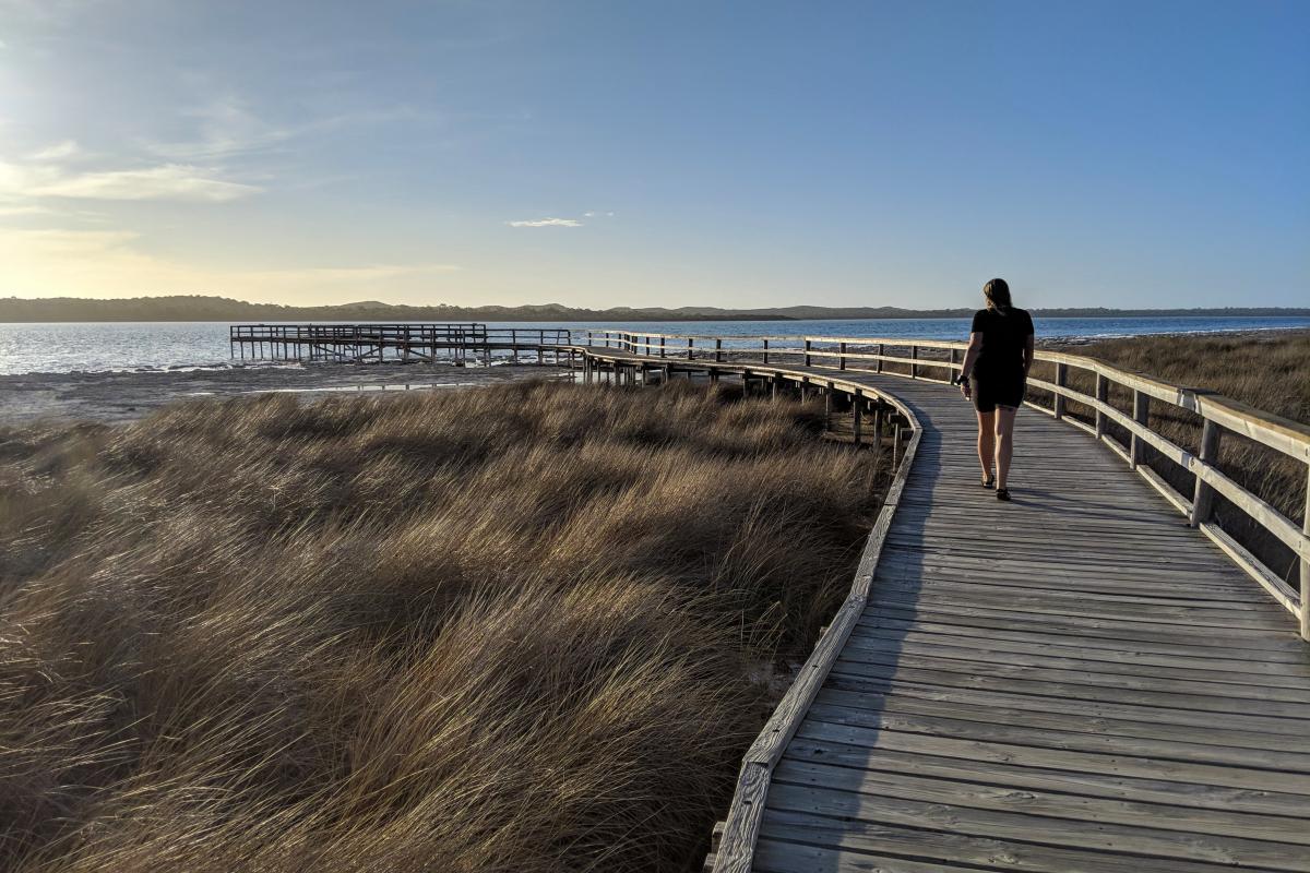 Person walking on the Lake Clifton Thrombolites jetty