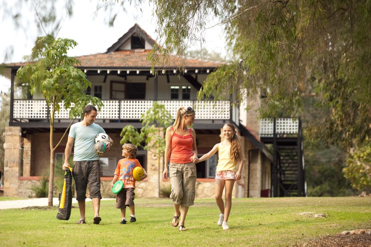 McNess Visitor Centre, Yanchep National Park. people walking towards the front of the mcness visitor centre