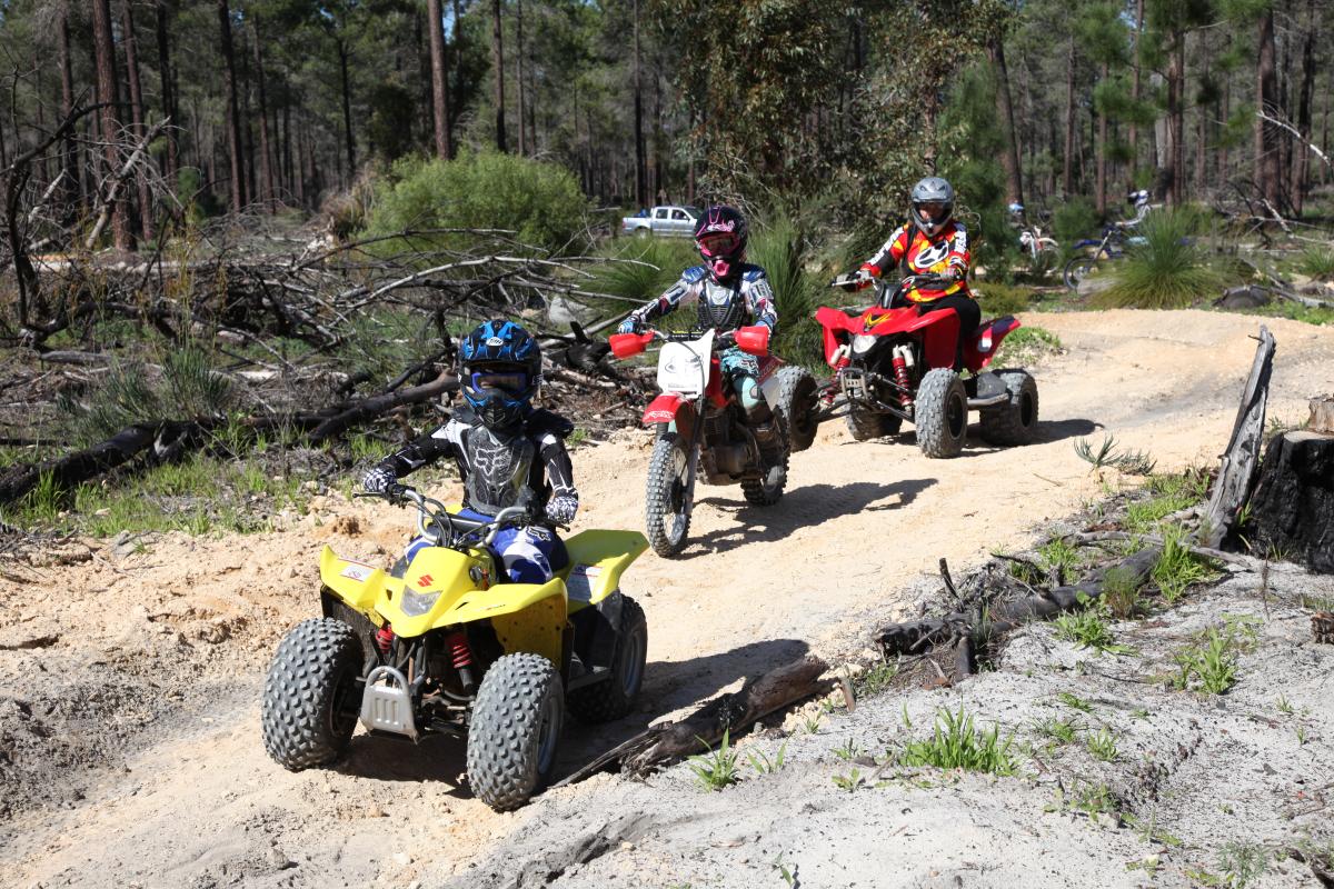 a family enjoying the motorcycle trail