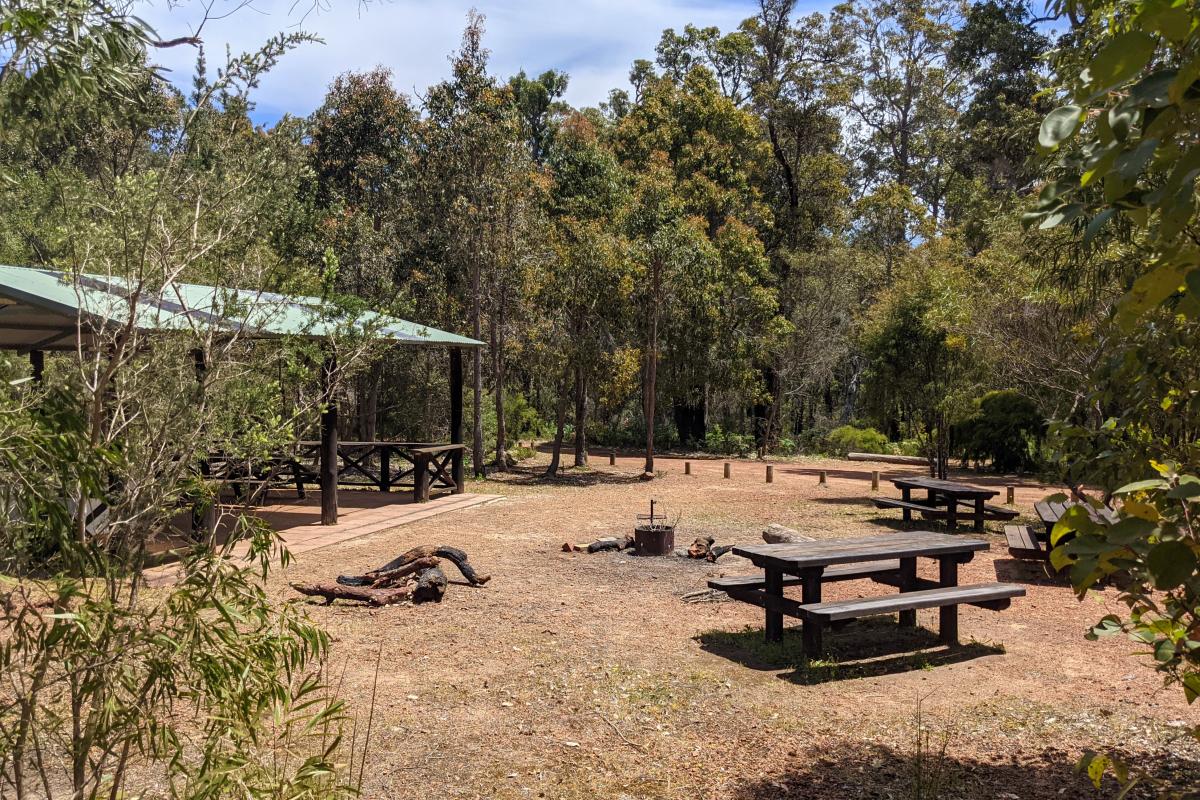 Picnic benches and shelter in the middle of Warner Glen Campground