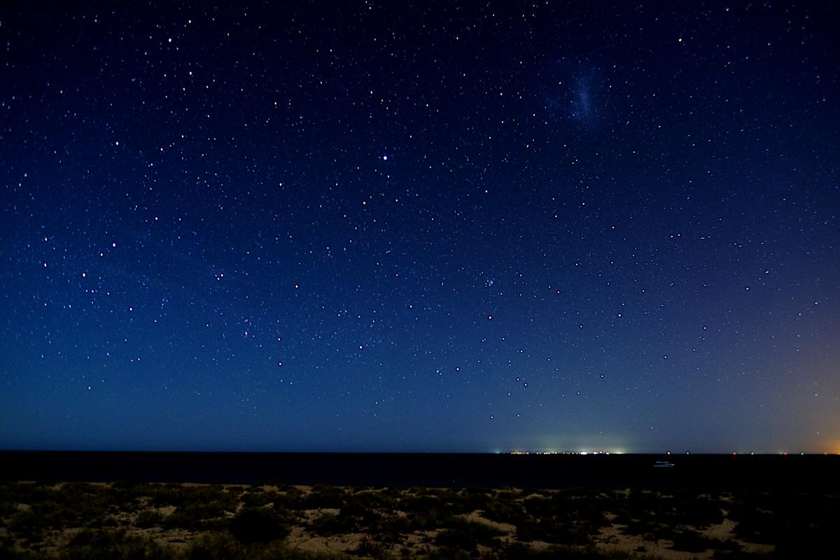 Canopy of stars in the night sky overlooking the ocean on Thevenard Island