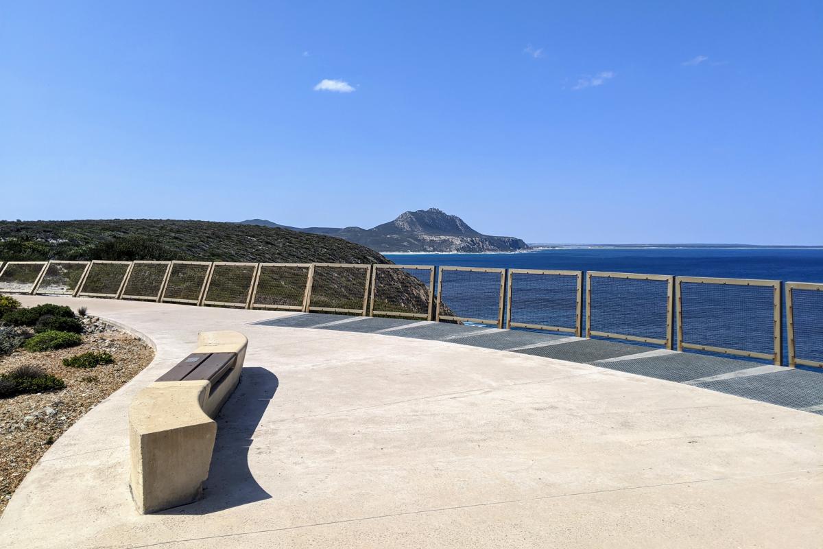 A large lookout at Cave Point with a view of East Mount Barren and the coastline beyond