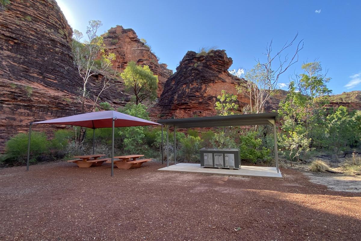 shelters with picnic tables and bbq's at Mirima