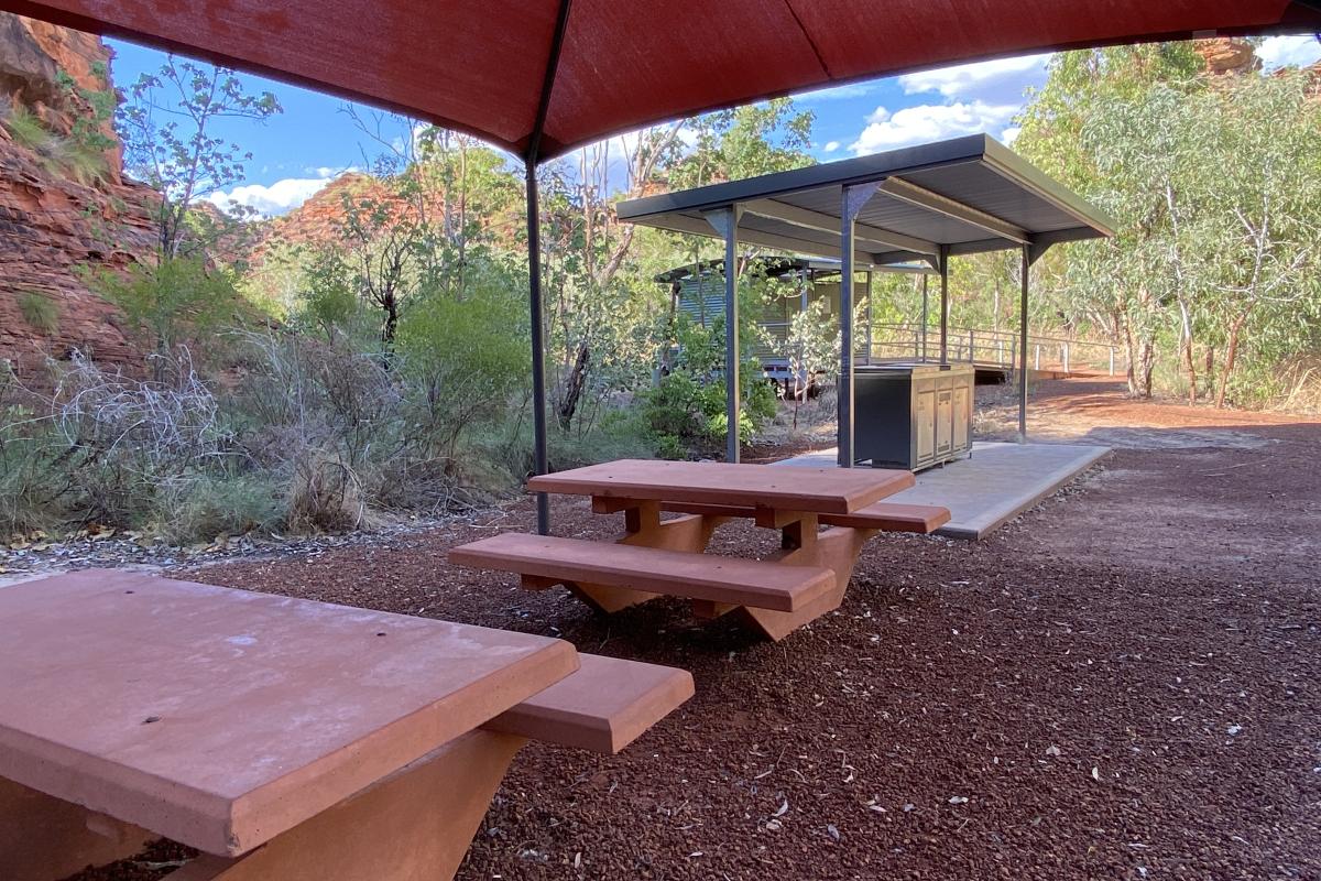 shelters with picnic tables and bbq's at Mirima