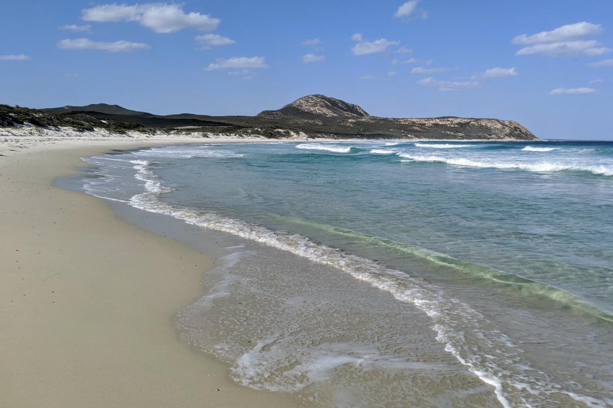 Mylies Beach gentle waves role into the shore at Mylies Beach