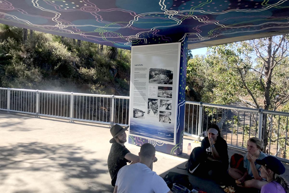 Information Shelter People sitting in the information shelter at Wellington Dam Lookout