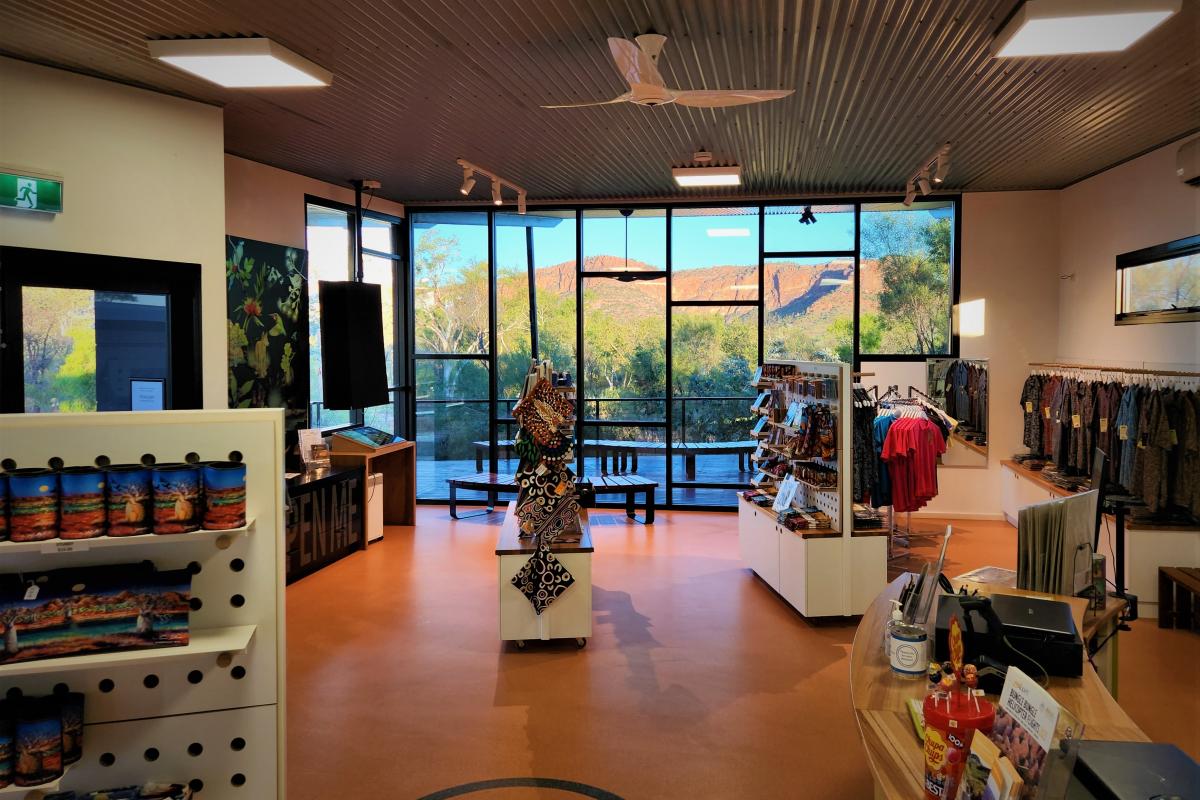 Inside the visitor centre shop with a view of the bush outside. 