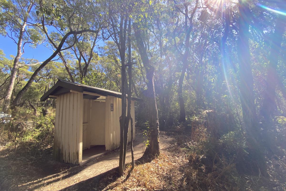 Boranup Campground toilet Small structure surrounded by forest