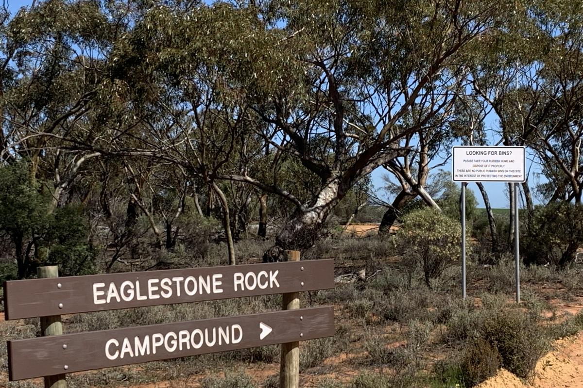 Wooden sign to campground.