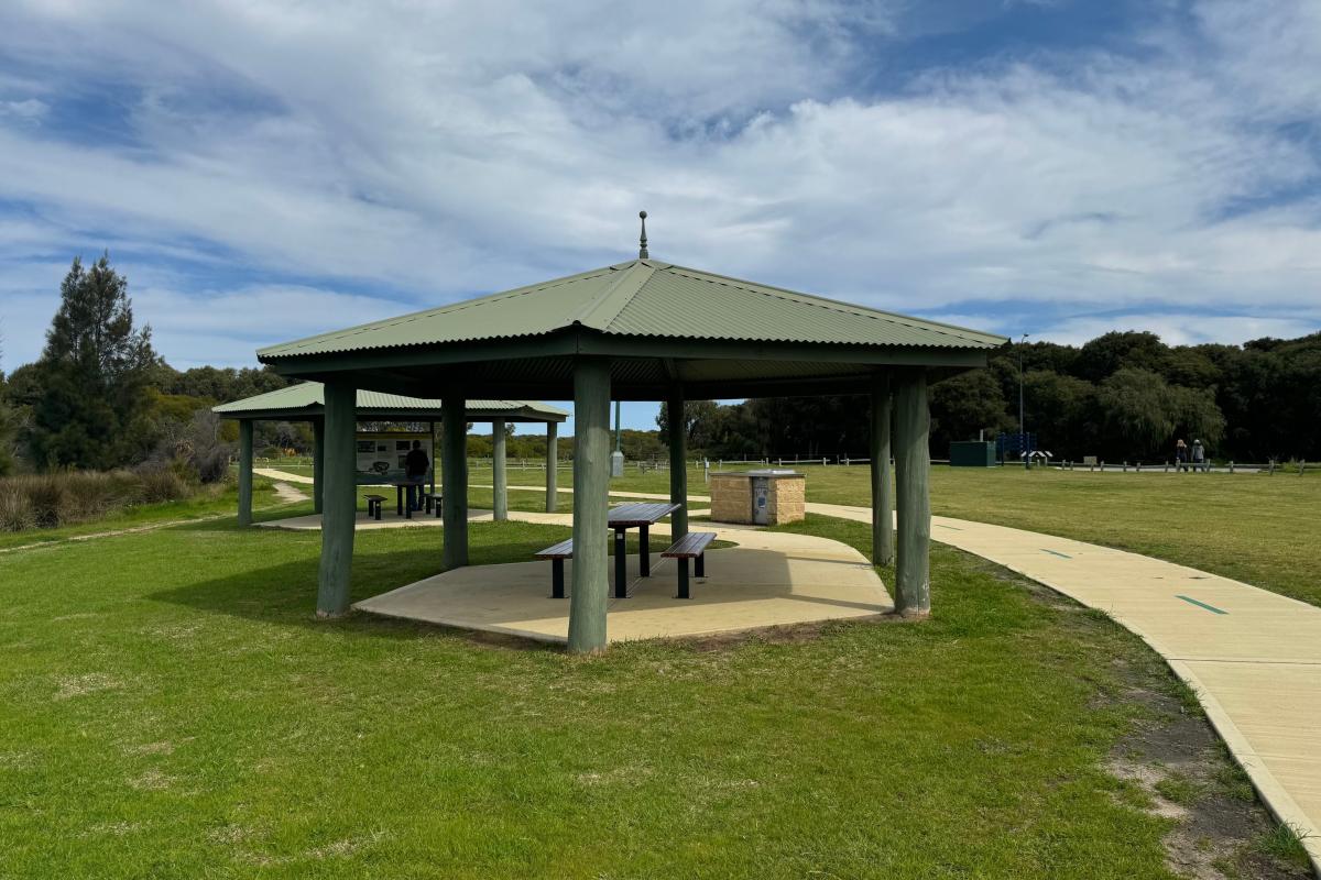 Picnic tables under shelters at Lake Richmond Picnic tables under shelters at Lake Richmond