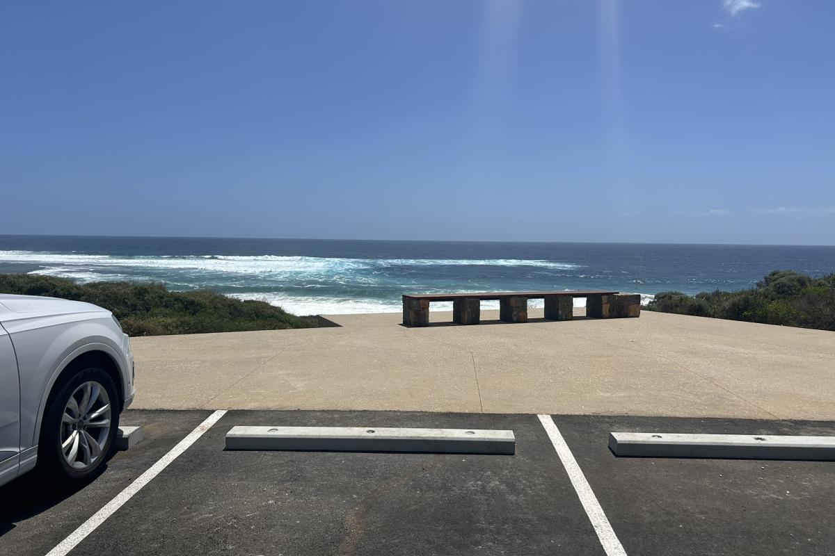 Rabbit Hill Stone bench looking out over ocean.