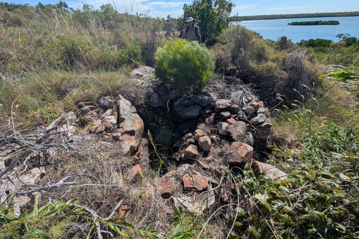 Large rocks stacked to create water management Aboriginal artefact.