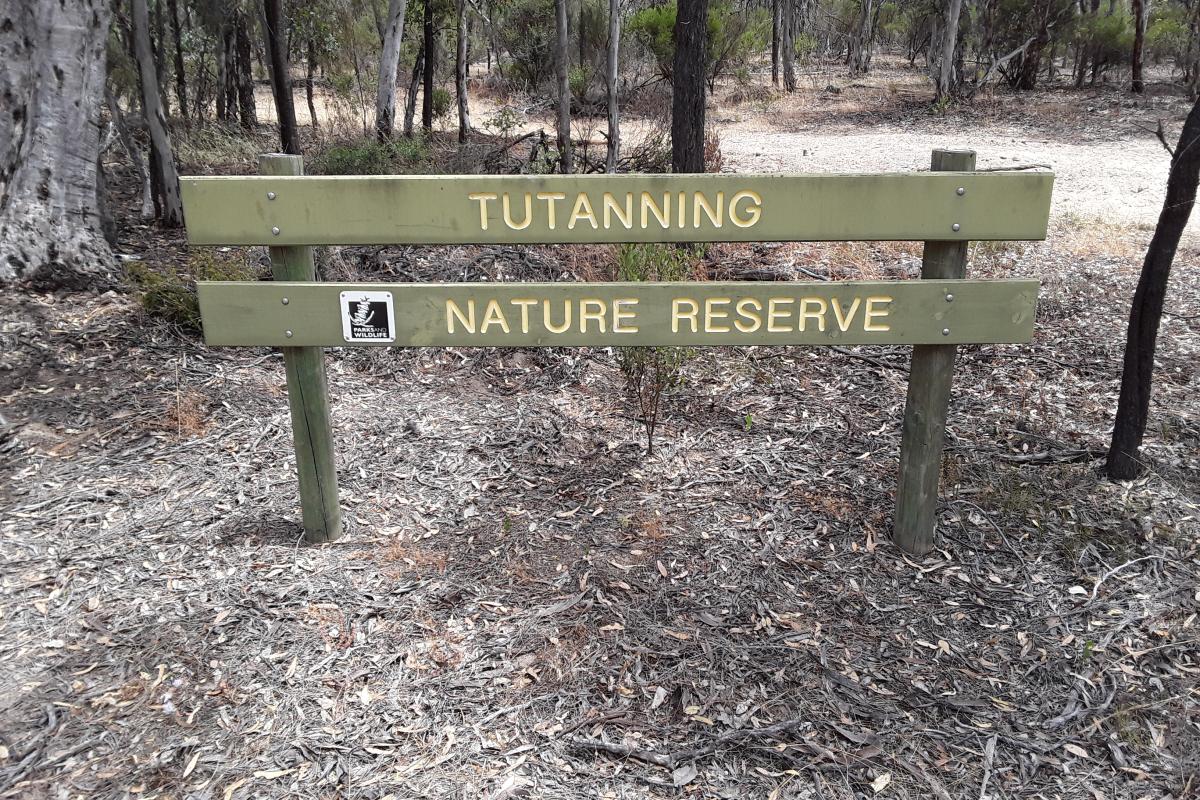Tutanning Nature Reserve Wooden sign that says Tutanning Nature Reserve.